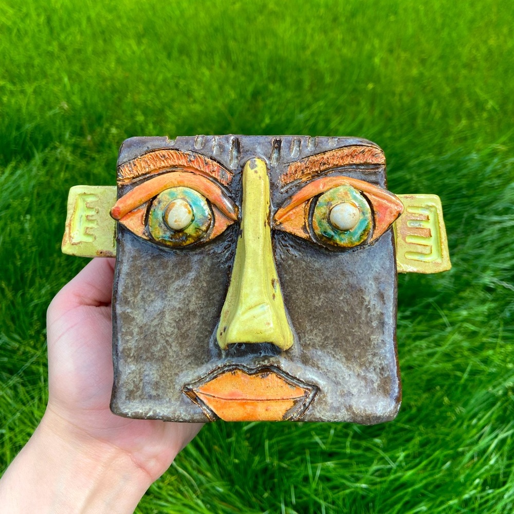 handmade ceramic face wall art